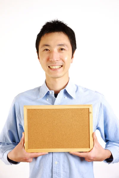 Японский мужчина с массажной доской　 — стоковое фото